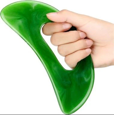 Gua sha masāžas rīks ar roktura sveķiem